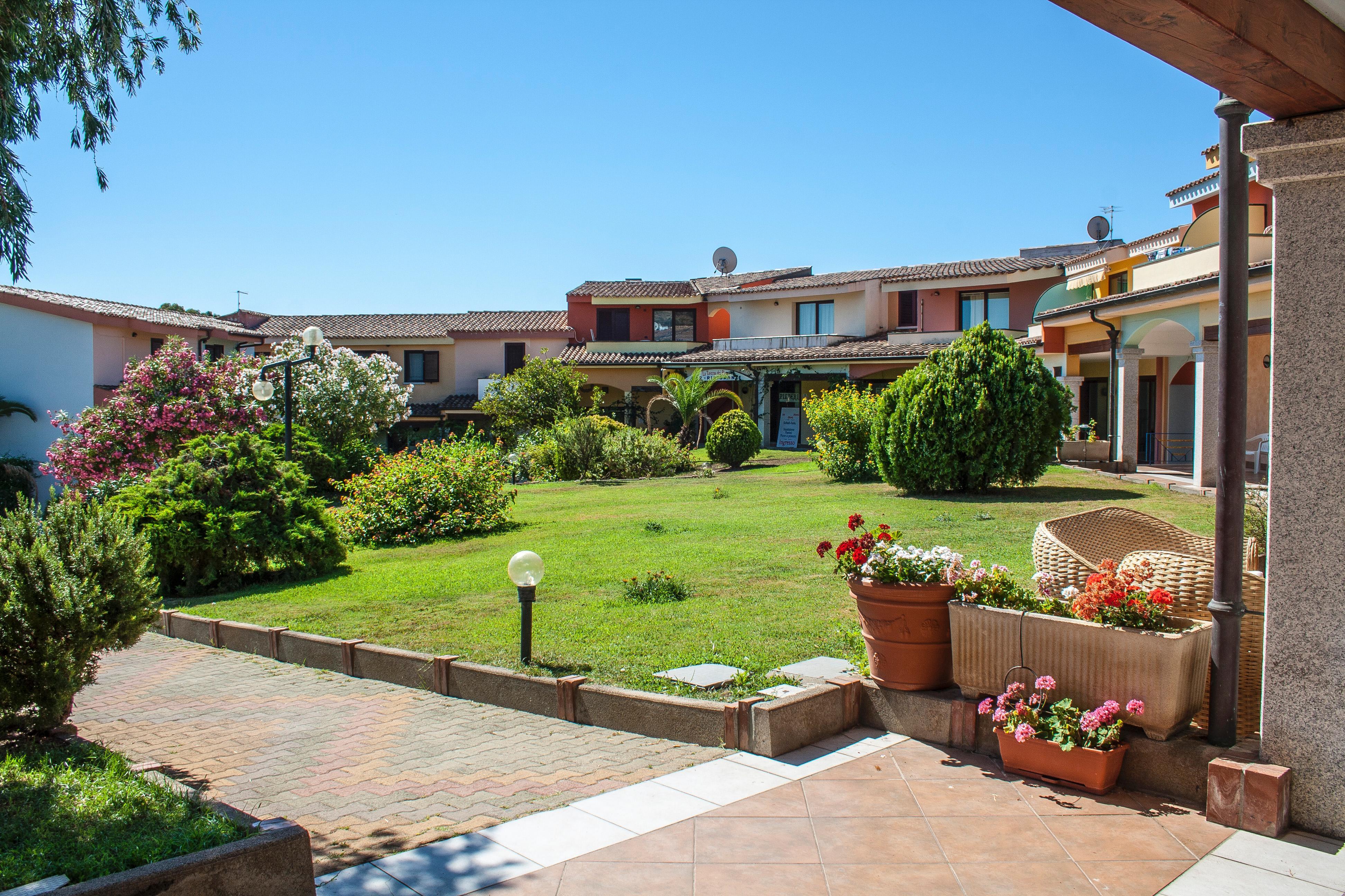 Residence Oasi Anfiteatro Porto Ottiolu Esterno foto